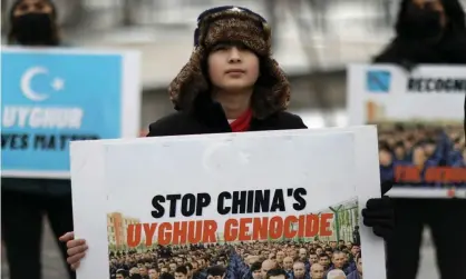  ?? Photograph: Leah Millis/Reuters ?? Umer Jan attends a rally on 19 February outside the Canadian embassy to encourage Canada in labeling China’s treatment of its Uighur population as genocide.