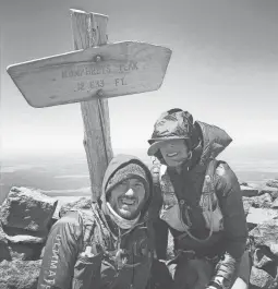  ?? COURTESY OF MEGHAN SLAVIN ?? Meghan Slavin (right) with her husband, Brian Slavin, at Humphreys Peak on June 7. She had just completed a trek from the bottom of the Grand Canyon to the top of the mountain.