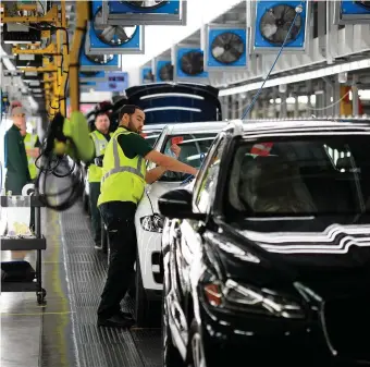  ??  ?? End of theline? Jaguar Land Rover staff in England face the axe as 5,000 jobs go