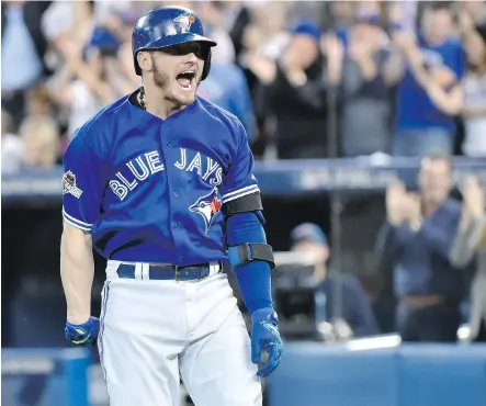  ?? NATHAN DENETTE/ THE CANADIAN PRESS ?? The Blue Jays’ Josh Donaldson reacts after hitting a two- run home run during the Jays 11- 8 win Monday night over Kansas City in Toronto. It got the team back in a series, which the Royals now lead 2- 1.