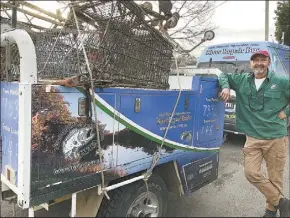  ??  ?? Harro with a trailer loaded with shopping trolleys pulled out of the Bell River. PHOTO: DUBBO PHOTO NEWS.