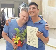  ?? MILWAUKEE JOURNAL SENTINEL FILES ?? Matt Schrek (left) and Jose Fernando Guitterez were the first couple to get married at the Milwaukee County Courthouse after the ban on same-sex marriage was revoked in June 2014.