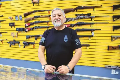  ?? JON AUSTRIA/JOURNAL ?? ABQ Guns owner Arnie Galegos stands at his store in Albuquerqu­e on Thursday.