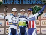  ??  ?? Cromwell, centre, on the podium after winning the 2013 edition of Omloop Het Nieuwsblad