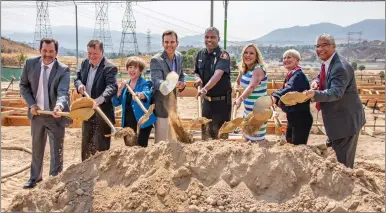  ?? Cory Rubin/ The Signal ?? From left: Mark Pestrella, Los Angeles County director of Public Works; Councilman Bob Kellar; Mayor Pro Tem Marsha McLean; Councilman Cameron Smyth; Los Angeles County Fire Chief Daryl Osby; Los Angeles County 5th District Supervisor Kathryn Barger; Mayor Laurene Weste; and Councilman Bill Miranda break ground at the new Fire Station 104 site. (Below) An artist’s design displays the new Fire Station 104, which will be located at 26901 Golden Valley Road, near Newhall Ranch Road.