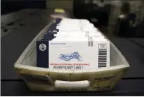  ?? MATT SLOCUM — THE ASSOCIATED PRESS ?? Mail-in ballots for the 2020 General Election in the United States are seen before being sorted at the Chester County Voter Services office in West Chester.