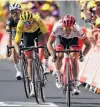  ?? PHOTO: REUTERS ?? Germany’s John Degenkolb beats Greg van Avermaet, of Belgium, in the sprint to the finish of stage nine of the Tour De France yesterday.