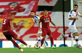  ?? NMC POOL ?? Fab finish: Fabinho rifles home Liverpool’s third goal