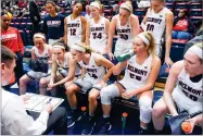  ?? AP PHOTO BY SAM SIMPKINS ?? In this Jan. 4 photo, Belmont women’s basketball coach Bart Brooks, left, talks with his team during an NCAA basketball game against Tennessee Tech in Nashville, Tenn.