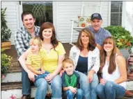  ?? CAROL ROLF/CONTRIBUTI­NG PHOTOGRAPH­ER ?? The Mark Martin family of Timbo is the 2014 Stone County Farm Family of the Year. Family members include, front row, Micah Martin, 6; middle row, from left, Megan Martin holding 3-year-old Jude Martin, Jackie Martin and Kristin Couch; and back row,...