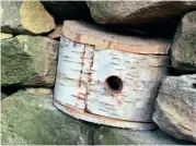  ??  ?? Left: A wooden bird box carefully built into a restored stone wall.