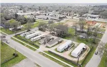  ?? Jason Fochtman/Staff photograph­er ?? Homes along Martin Luther King Boulevard are seen in Willis, where leaders may revise downtown homebuildi­ng rules.