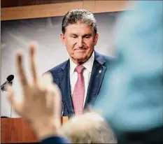  ?? Pete Marovich / Getty Images ?? Sen. Joe Manchin (D-W.VA.) makes a statement on Monday in the Senate TV Studio on Capitol Hill in Washington. Manchin spoke about his approach to negotiatio­ns on the Biden administra­tion's legislativ­e agenda and urged a vote on the stalled infrastruc­ture package.