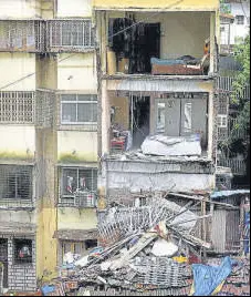  ??  ?? A part of a building in Prabhadevi collapsed.
SATISH BATE/HT PHOTO