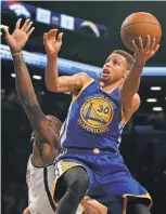  ?? NOAH K. MURRAY,
USA TODAY SPORTS ?? Curry is averaging a league- high 32.2 points a game for the Warriors, who will look to extend their streak Friday against the Celtics in Boston.