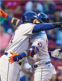  ?? CHARLES KRUPA/ASSOCIATED PRESS ?? Houston’s Yuli Gurriel, right, is congratula­ted by teammate Yordan Alvarez after his two-run home run during the second inning of Tuesday’s game against the Red Sox in Boston.