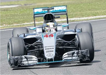  ??  ?? Lewis Hamilton of Mercedes steers his car during the second practice session for the Malaysian Grand Prix.