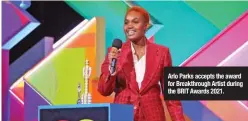  ??  ?? Arlo Parks accepts the award for Breakthrou­gh Artist during the BRIT Awards 2021.