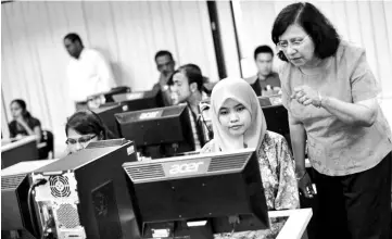  ??  ?? TalentCorp is positive on the government’s efforts to improve the developmen­t of Malaysia’s human capital, particular­ly its move to empower the women workforce. — AFP photo