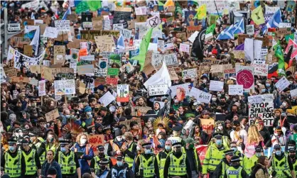  ?? Photograph: Jeff J Mitchell/Getty Images ?? Fridays For Future march on 5 November 2021 in Glasgow on day six of Cop26. The World Economic Forum says the climate crisis is the biggest global risk.