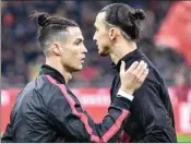  ??  ?? Juventus’ Cristiano Ronaldo with AC Milan’s Zlatan Ibrahimovi­c