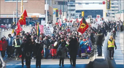  ?? CP PHOTO ?? Family and supporters of Thelma Favel, Tina Fontaine’s great-aunt and the woman who raised her, marched today, Friday, in Winnipeg the day after the jury delivered a not-guilty verdict in the 2nd degree murder trial of Raymond Cormier.