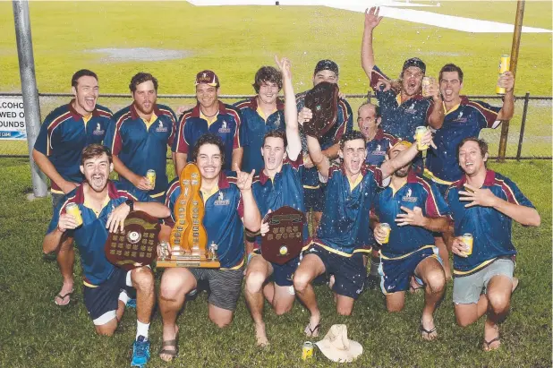  ?? Picture: JUSTIN BRIERTY ?? CHAMPIONS: Atherton players celebrate their Cricket Far North two-day grand final win at Griffiths Park.