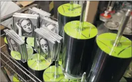  ??  ?? RSB iMedia has manufactur­ed more than 1 million copies of singer Adele’s megahit, 21, out of its plant in a St. Laurent strip mall, where 60 full-time employees work.