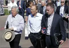  ?? BOSTON HERALD FILE ?? TRIPLE THREAT: From left, Pats owner Robert Kraft, team president Jonathan Kraft and vice president of media relations Stacey James attend the league meetings in 2013.