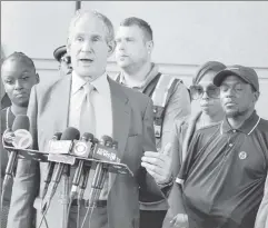  ?? ?? Ban the man: MTA head Janno Lieber (left) outside court Friday with transit cleaner Anthony Nelson, whose arm remains in a sling from his attack.