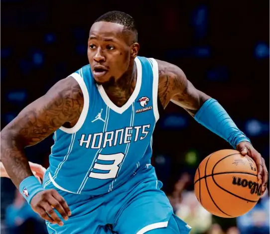  ?? NELL REDMOND/ASSOCIATED PRESS ?? Terry Rozier averaged 20 points per game in his four-plus seasons in Charlotte, but the Hornets never made the playoffs.