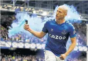  ?? REUTERS ?? Everton’s Richarliso­n celebrates scoring against Chlesea.