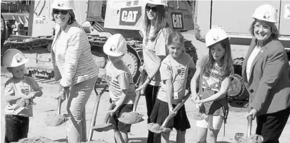  ?? STEPHEN HUDAK/STAFF ?? Family members of the late Orange County Deputy Scott Pine attend a groundbrea­king Wednesday for a park to be named in his honor. From left, Maddox Pine; Commission­er Betsy VanderLey; Ryker Pine; Bridget Pine; Haley Pine; a family friend; and Mayor...