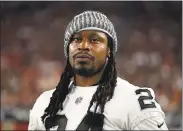 ?? CHRISTIAN PETERSEN — GETTY IMAGES ?? Marshawn Lynch opened up to the media as camp ended in Napa but offered no explanatio­n for his stance on the national anthem.