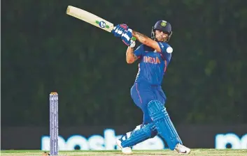  ?? AFP ?? India’s Ishan Kishan pulls one to the fence during the ICC Twenty20 World Cup warm-up match against England at the ICC Cricket Academy Ground in Dubai on Monday.