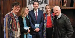  ??  ?? LEFT: Minister for Tourism and Sport Brendan Griffin performs the official launch of Féile na Bealtaine in An Díseart on Thursday in front of a gathering in mixed states of attentiven­ess. RIGHT: Peadar Ó Fionnáin of Féile na Bealtaine, Rachel Holstead of Ealaíon na Gaeltachta, Minister Griffin, Kerry County Arts Officer Kate Kennelly and Fr Jim Sheehy at the launch.