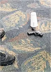  ?? MARK LEA/AP ?? The pistol of alleged shooter Esteban Santiago at the Fort Lauderdale-Hollywood Internatio­nal Airport.