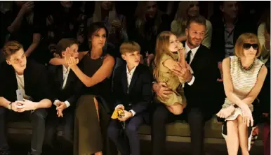  ??  ?? Above right Victoria, Victoria Beckham, resort 2015. Right the Beckhams at Burberry with Anna Wintour
