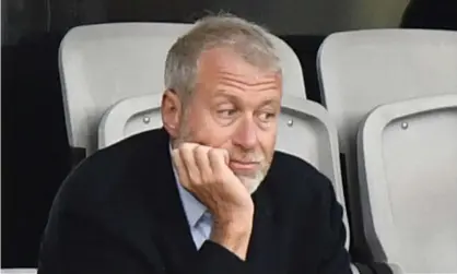  ?? Martin Meissner/AP ?? Roman Abramovich sued over a number of claims including that he bought Chelsea football club on Vladimir Putin’s orders. Photograph: