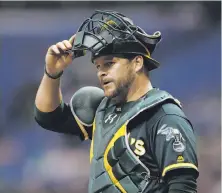  ?? Chris O'Meara / Associated Press ?? Catcher Stephen Vogt, 32, was an All-Star with the A’s in 2015 and 2016 but was designated for assignment Thursday.