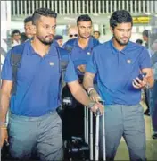  ?? PTI PHOTO ?? Sri Lanka skipper Dinesh Chandimal (right) arrives with teammates at the Kolkata airport on Wednesday.