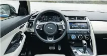  ?? JAGUAR ?? The clean cabin design of the 2018 Jaguar E-Pace mirrors the driver-focused dash layout of the F-Pace, with large, easily readable gauges.