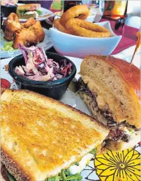  ?? DIANE GALAMBOS PHOTOS SPECIAL TO THE HAMILTON SPECTATOR ?? Mona Lisa Grilled Cheese, left, and Mac Daddy Burger.