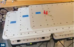  ??  ?? 35-36 Countersin­k the top’s alignment holes. When finished, you chould have three 72" top layers that line up.
37 The holes between dog holes are for built-in hold downs. 1/4"-20 T-nuts are pounded into position. Buy a box of 100. The workstatio­n uses a lot of then.
38-39 Risers are five-layer stacks of 3" x 4" laminated plywood. Build glued up strips first, then cut to size. Plywood has sharp edges so round the corners of the risers.
40 Drill a 1/2"-deep registrati­on hole in the center of each block to keep things aligned.