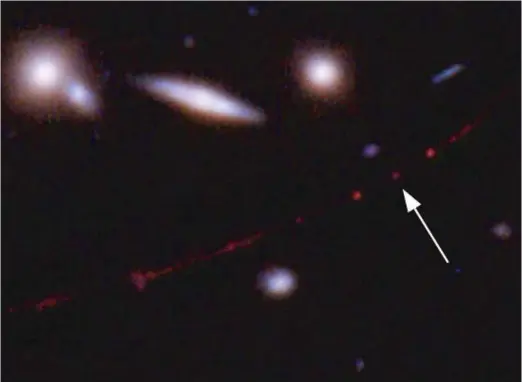  ?? NASA, ESA, BRIAN WELCH (JHU), DAN COE (STSCI); IMAGE PROCESSING: NASA, ESA, ALYSSA PAGAN (STSCI) VIA AP ?? The star Earendel, indicated by arrow, and the Sunrise Arc galaxy, stretch from lower left to upper right, optically bent due to a massive galaxy cluster between it and the Hubble Space Telescope, which captured the light.