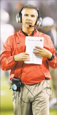  ?? Joe Robbins / Getty Images ?? The Register’s Joe Morelli doesn’t think Urban Meyer will be on the sidelines for Ohio State’s season opener.