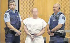  ?? REUTERS ?? Australian terrorist Brenton Tarrant makes a sign for photograph­ers in the Christchur­ch district court on Saturday.