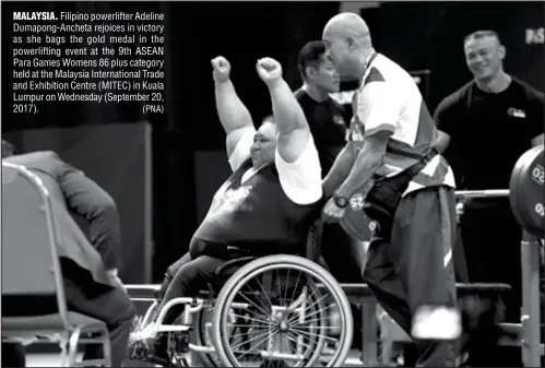  ?? (PNA) ?? MALAYSIA. Filipino powerlifte­r Adeline Dumapong-Ancheta rejoices in victory as she bags the gold medal in the powerlifti­ng event at the 9th ASEAN Para Games Womens 86 plus category held at the Malaysia Internatio­nal Trade and Exhibition Centre (MITEC) in Kuala Lumpur on Wednesday (September 20, 2017).