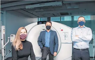  ??  ?? Neuroendoc­rine cancer survivor Sharon Needham (left) with her QEII oncologist, Dr. Daniel Rayson (middle), and QEII radiologis­t, Dr. Steven Burrell (right). The trio are working with the QEII Foundation and its donors to address an urgent cancer care need.