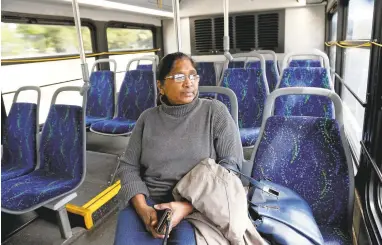  ?? GARY REYES/STAFF PHOTOS ?? Nayna Rana rides the Valley Transporta­tion Authority bus Line 13 along Almaden Expressway in San Jose. VTA is considerin­g reducing bus service on lines that have less ridership, such as Line 13.